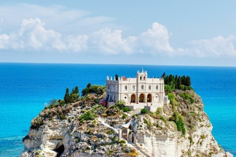 Tropea, Calabria Italy viewpoint of seaside town with cliffs and pastel houses